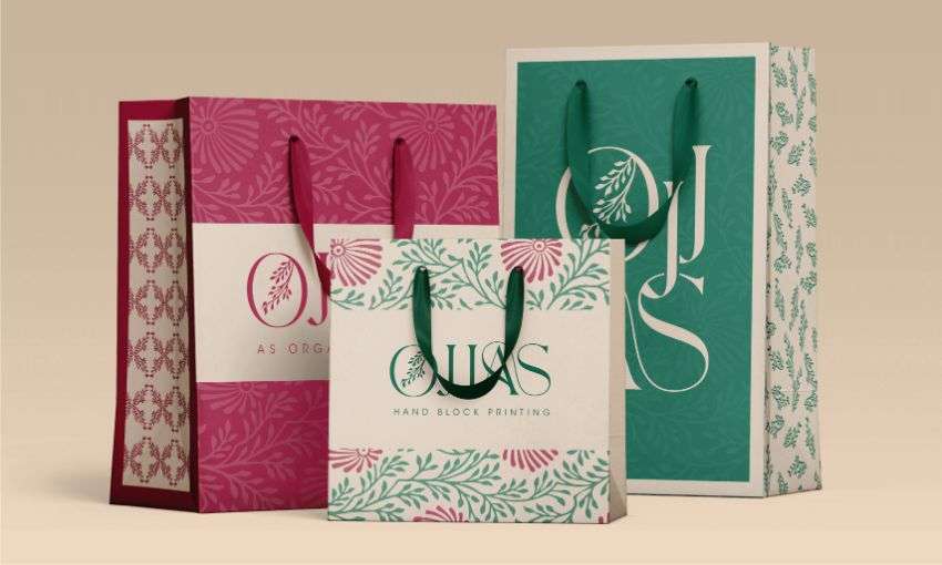 Three paper bag with green and Red floral print, designed by Avval Digital Marketing Company for Ojjas brand